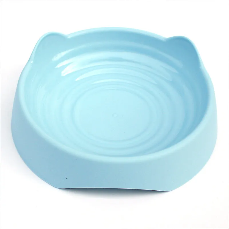 Blue ceramic dog slow feeder bowl with puzzle maze design for small or large breed dogs.
