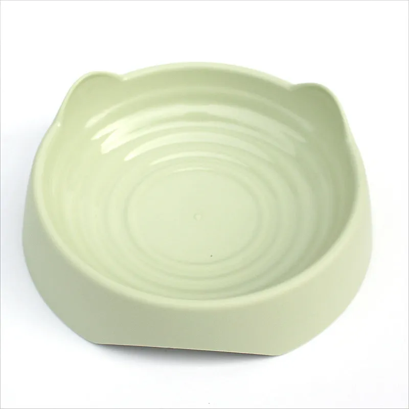 Blue ceramic dog slow feeder bowl with puzzle maze design for small or large breed dogs.