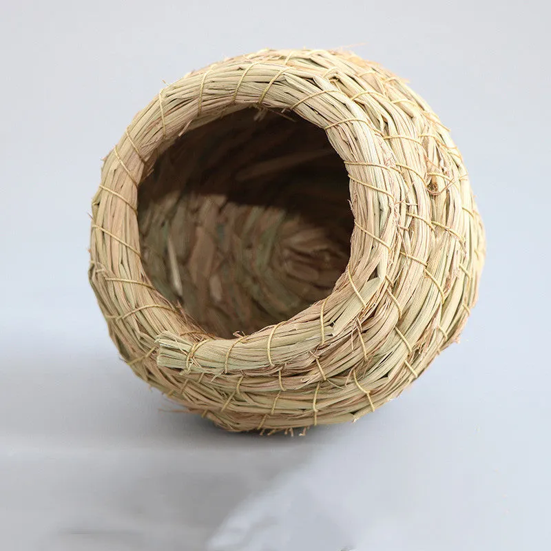 Hand-woven natural straw bird nest in khaki colour for small pets and birds