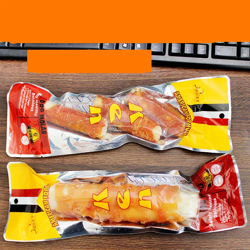 Dog teeth cleaning bones with chicken wrap around cowhide roll on white background