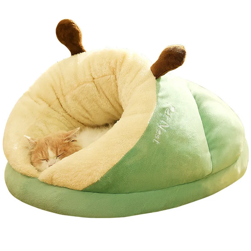 Warm slipper nest pet bed in crystal velvet with PP cotton, size S, avocado green colour, on a wooden floor