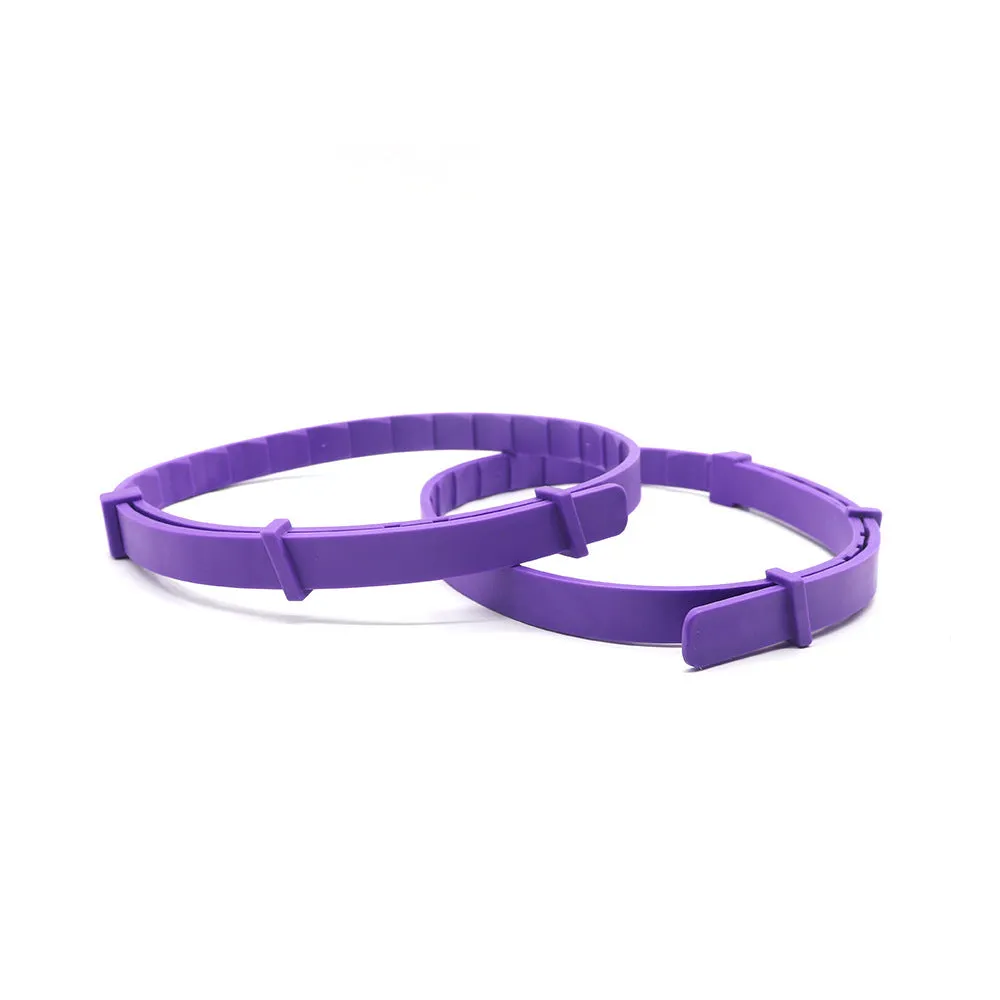 Pack of four soft TPR dog anxiety relief collars in various colours, showing the monochrome Chinese style pattern.