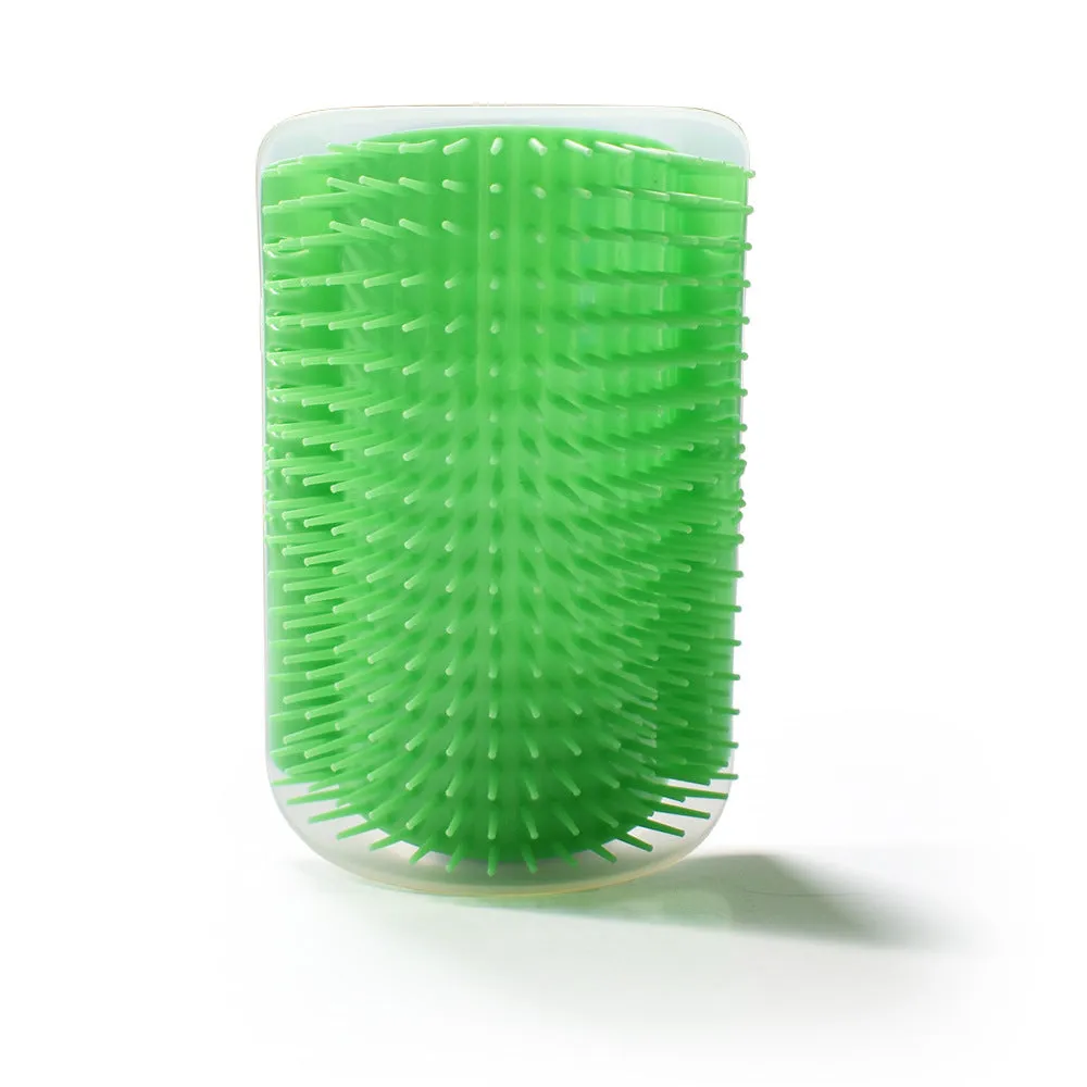 Cat grooming brush attached to wall corner with catnip for pet massage and shedding removal