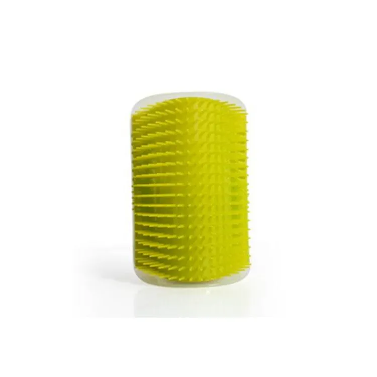 Cat grooming brush attached to wall corner with catnip for pet massage and shedding removal
