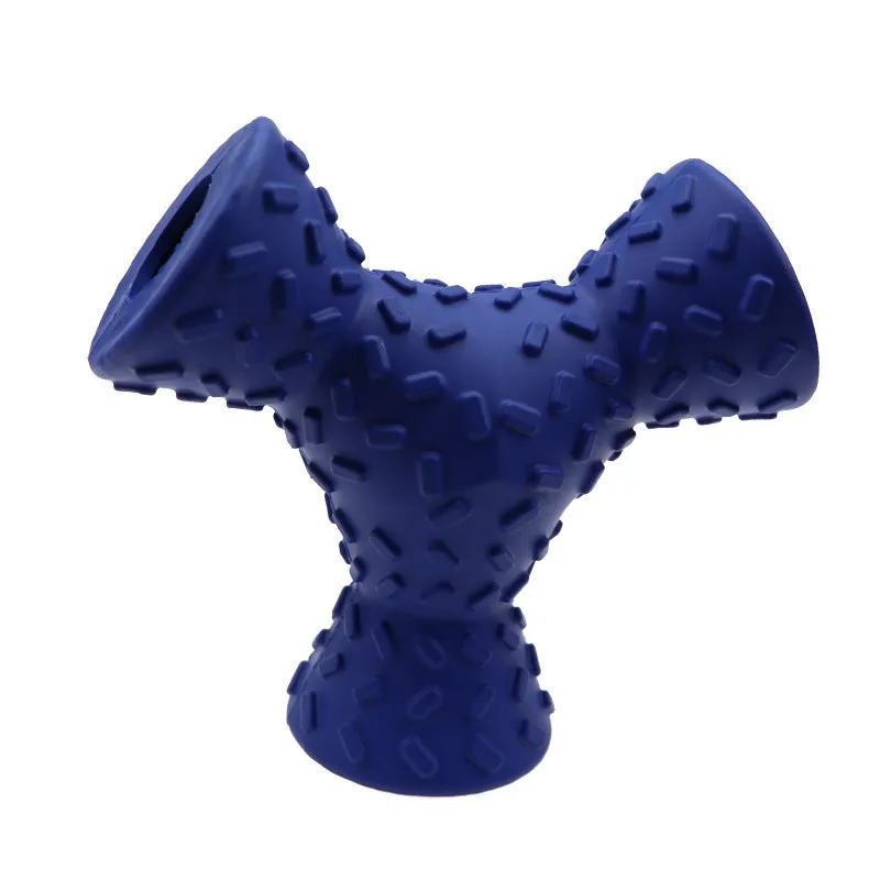Trihedron dog treat dispensing toy in blue on a plain background
