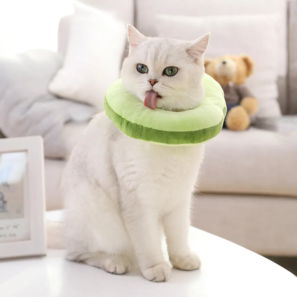 Cat wearing plush toast headdress collar with soft fabric, chain strap, side view on white background
