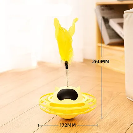 Pink cat tumbler turntable toy on a floor for feline self-play