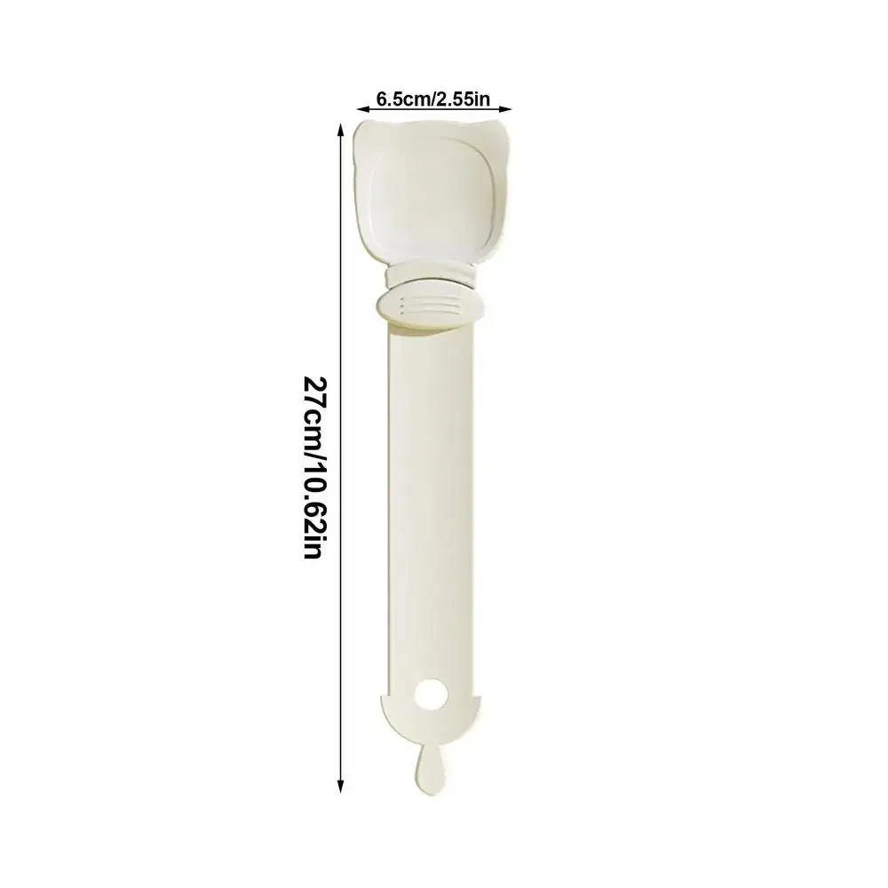 Cat Treat Spoon in green, orange, and white, measuring 27 x 6.5 cm, designed for scooping and serving cat strips