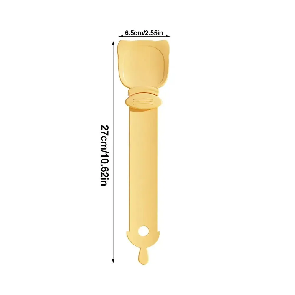 Cat Treat Spoon in green, orange, and white, measuring 27 x 6.5 cm, designed for scooping and serving cat strips