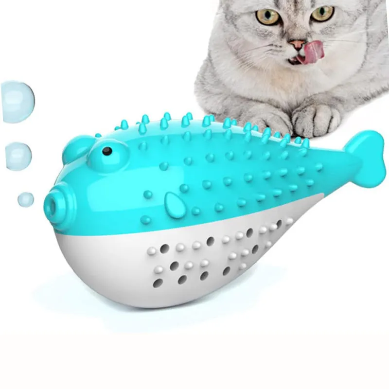 Mint Toys blue silicone cat fish chew toy and teaser on a plain surface showing fish shape and size.