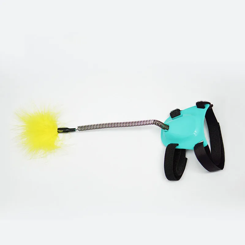 Green cat toy funny cat stick with strong feathers on a plain background