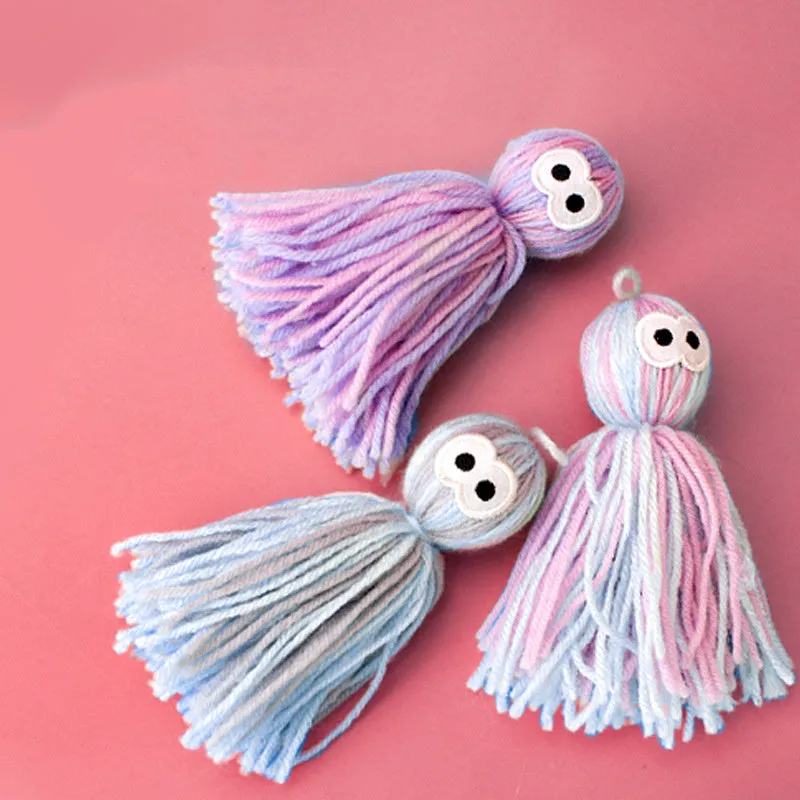 Hanging wool cat ball toy with teaser stick in blue grey, pink and blue, or pink purple colour options