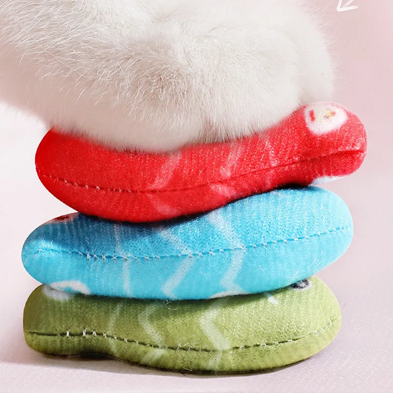 Sky blue plush simulated fish cat toy with realistic animal pattern on a neutral background.