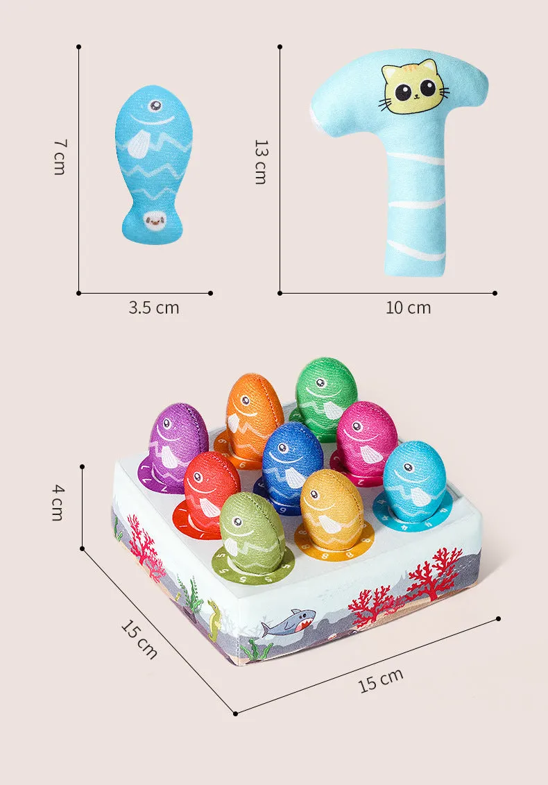Sky blue plush simulated fish cat toy with realistic animal pattern on a neutral background.