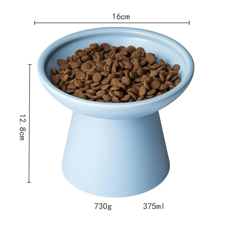 Ceramic elevated cat food bowl in blue colour with wide shallow design