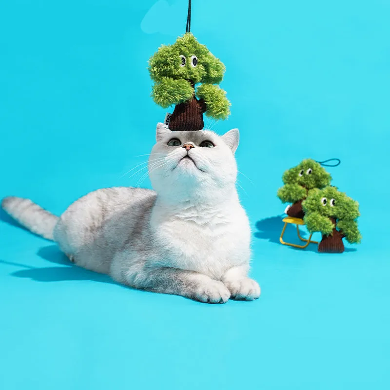 Pine tree shaped fabric cat toy pendant with catnip, shown in three sizes.