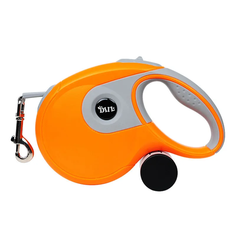 Dog automatic retractable leash with one-button break lock, soft hand grip, and black ABS body on a green background
