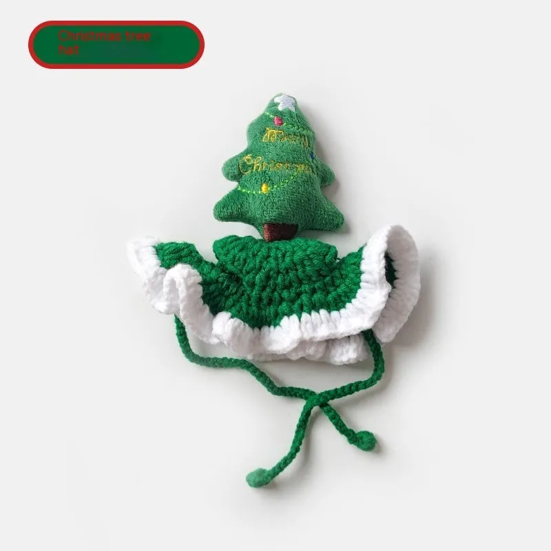 Hand crocheted monochrome Christmas tree pet hat with rope tie on a cat