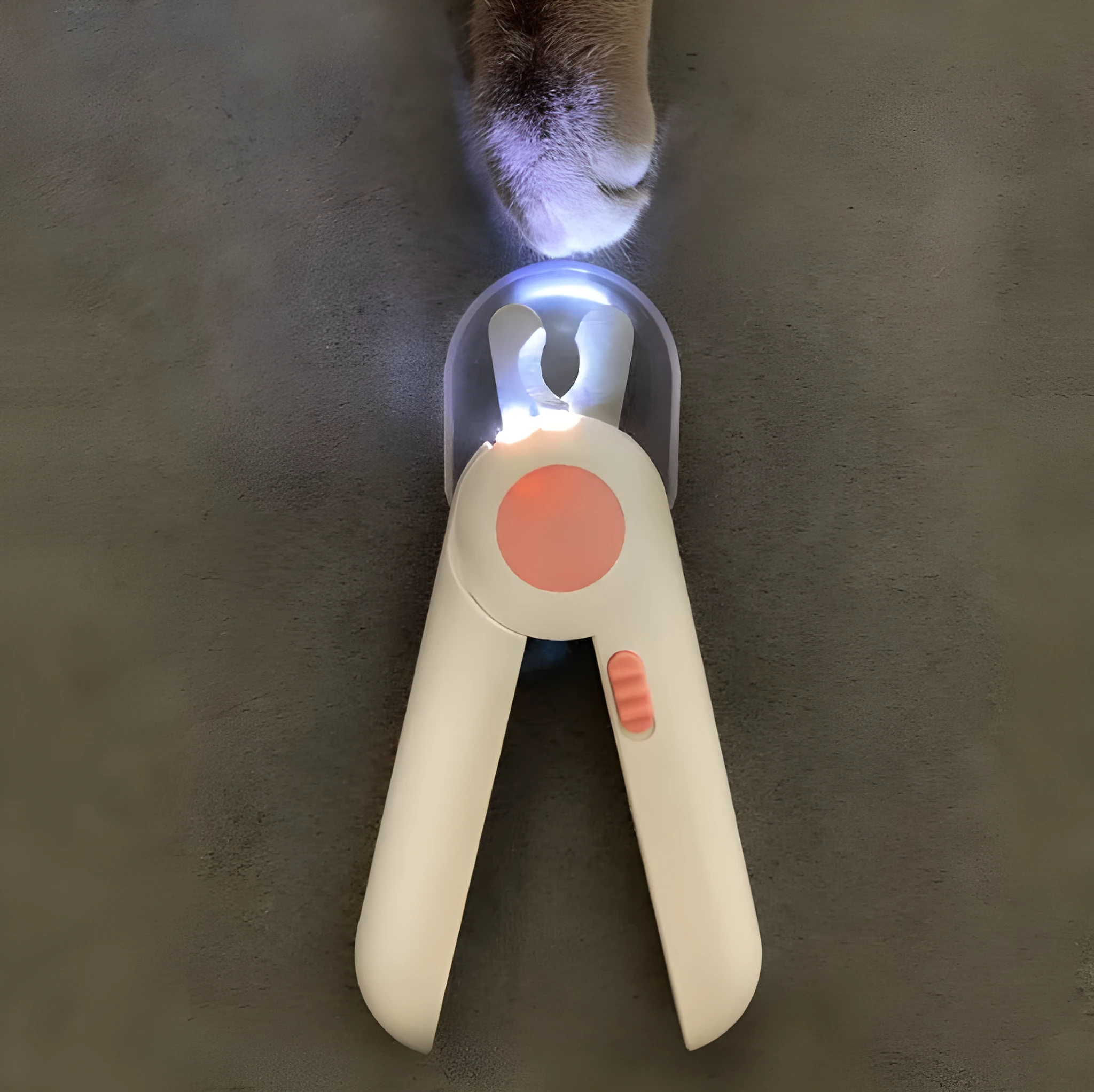Blue LED Pet Nail Clipper with stainless steel blade and light on a white background