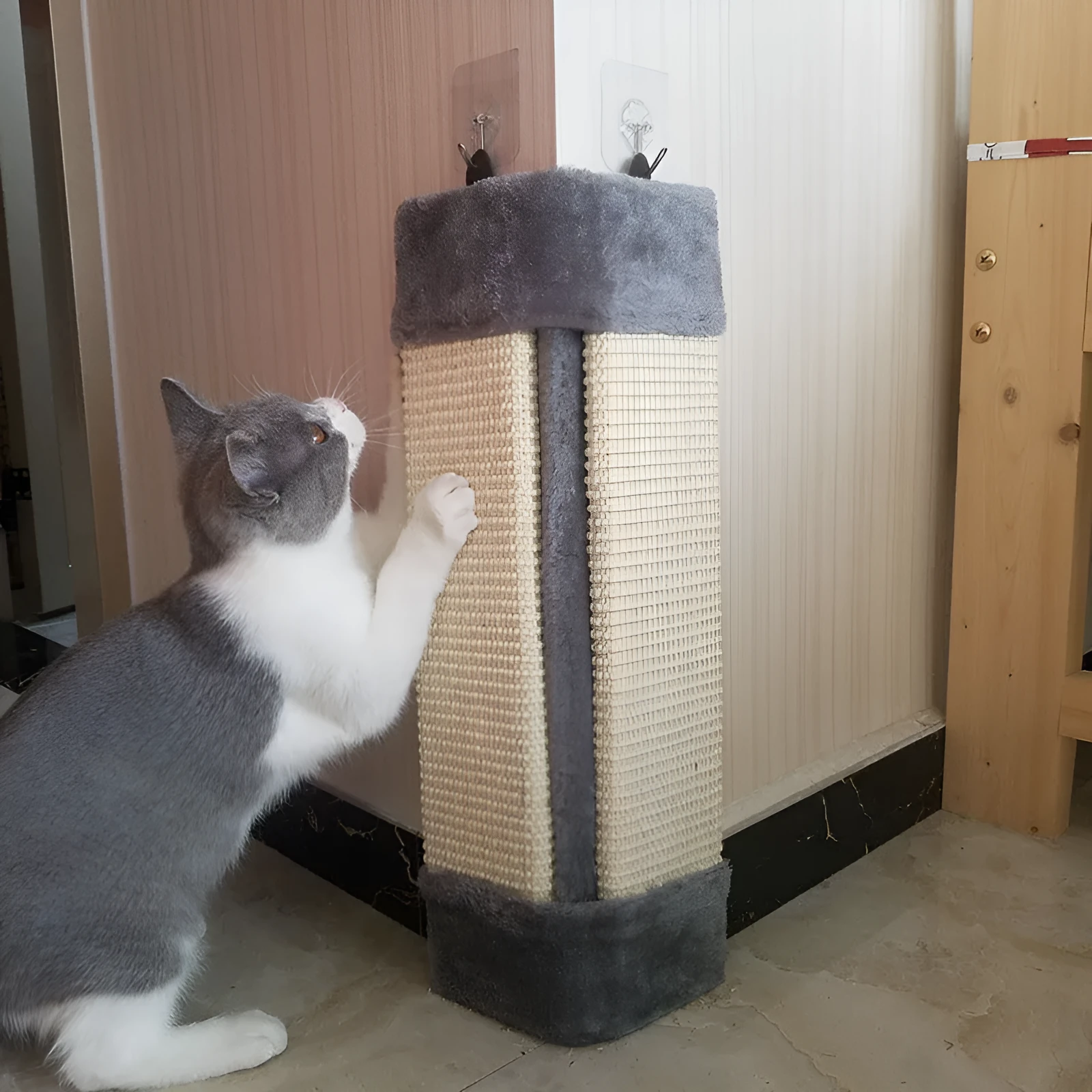 Foldable beige cat scratcher with sisal rope and CARB certified board on floor