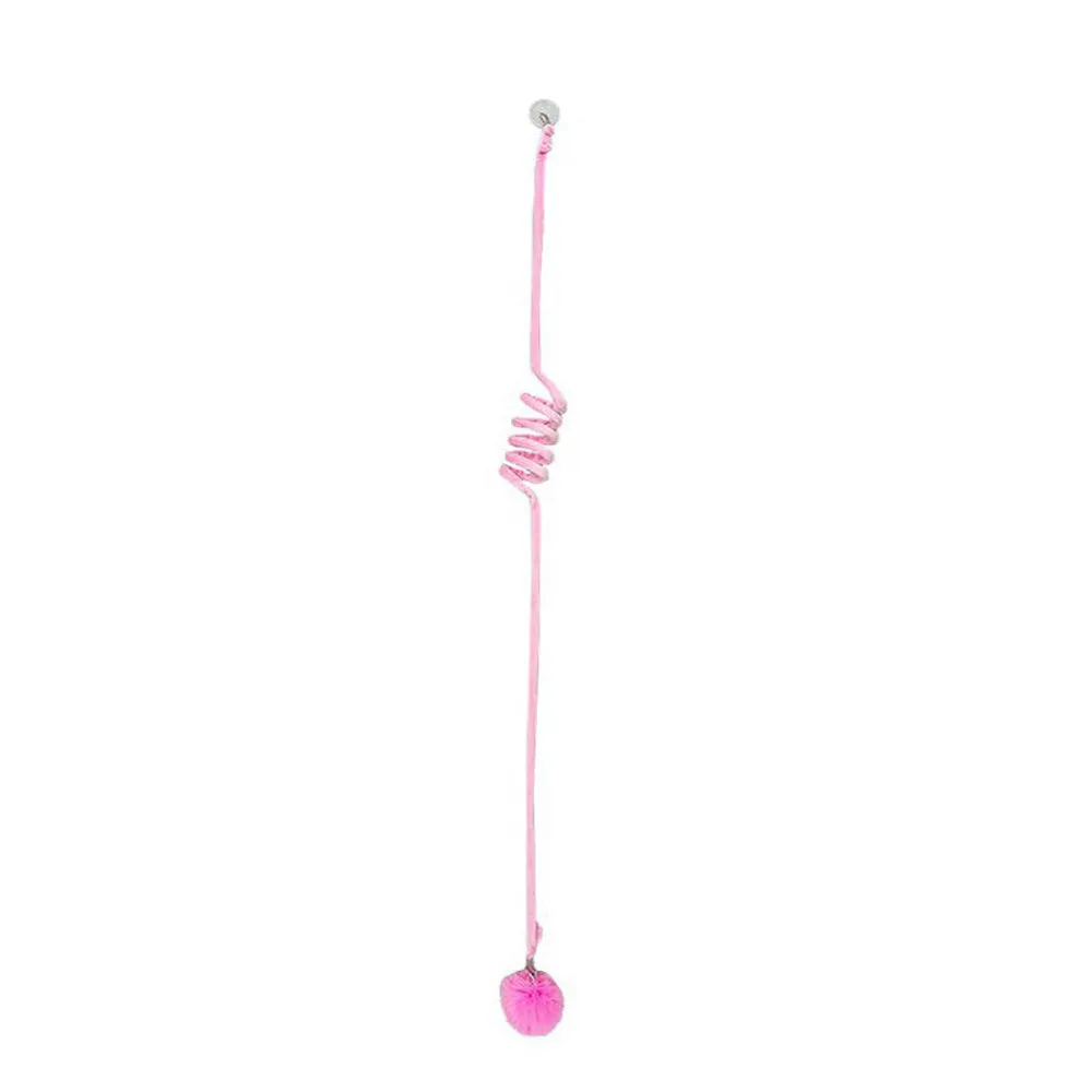 Spring-mounted inflatable ball cat toy with bell, attached to a door via a clear suction cup.