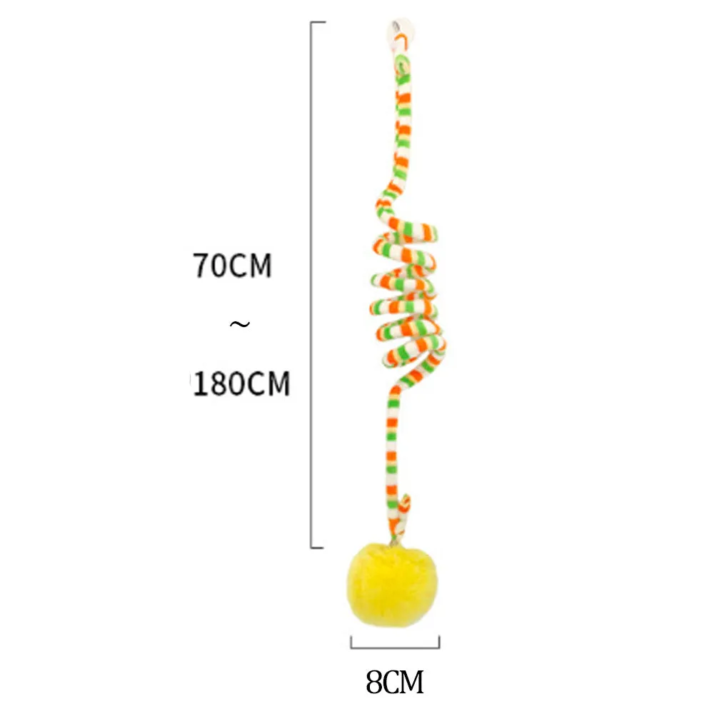 Spring-mounted inflatable ball cat toy with bell, attached to a door via a clear suction cup.