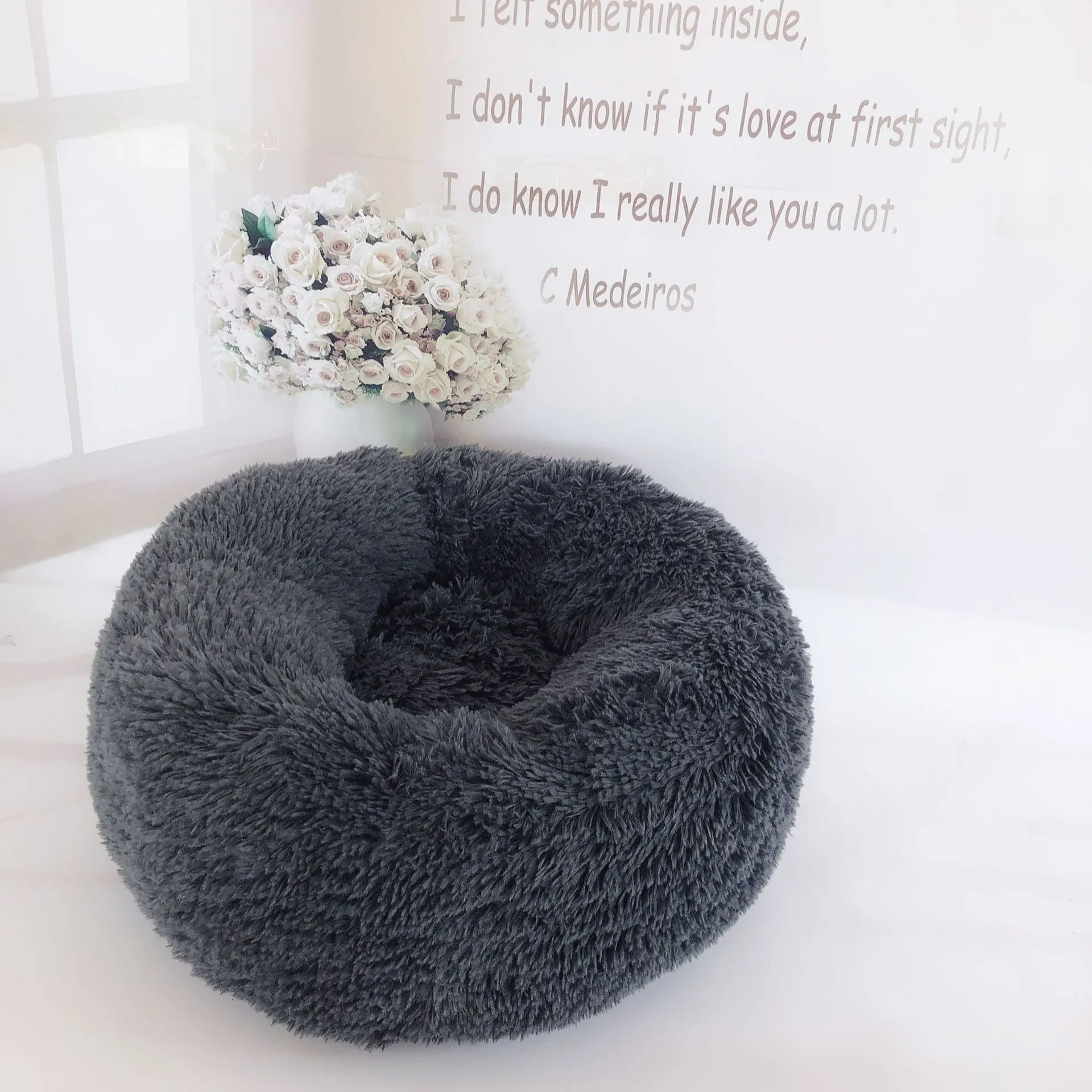 Round plush pet bed 110cm diameter in soft vegan fur fabric, available in multiple colours for small dogs and cats