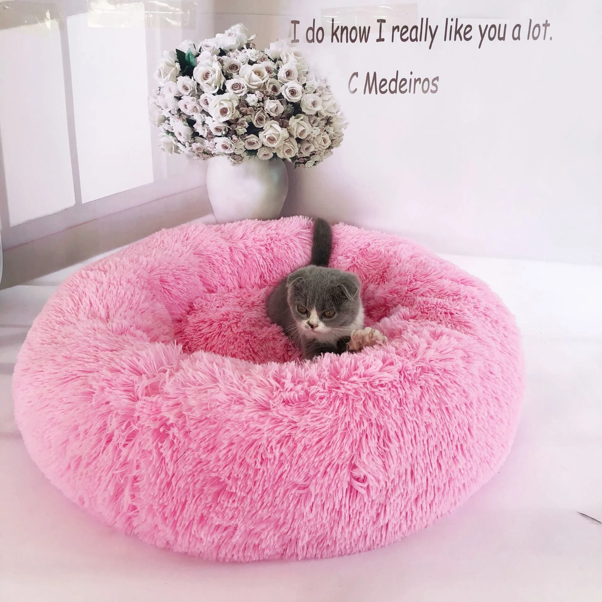 Round plush pet bed 110cm diameter in soft vegan fur fabric, available in multiple colours for small dogs and cats