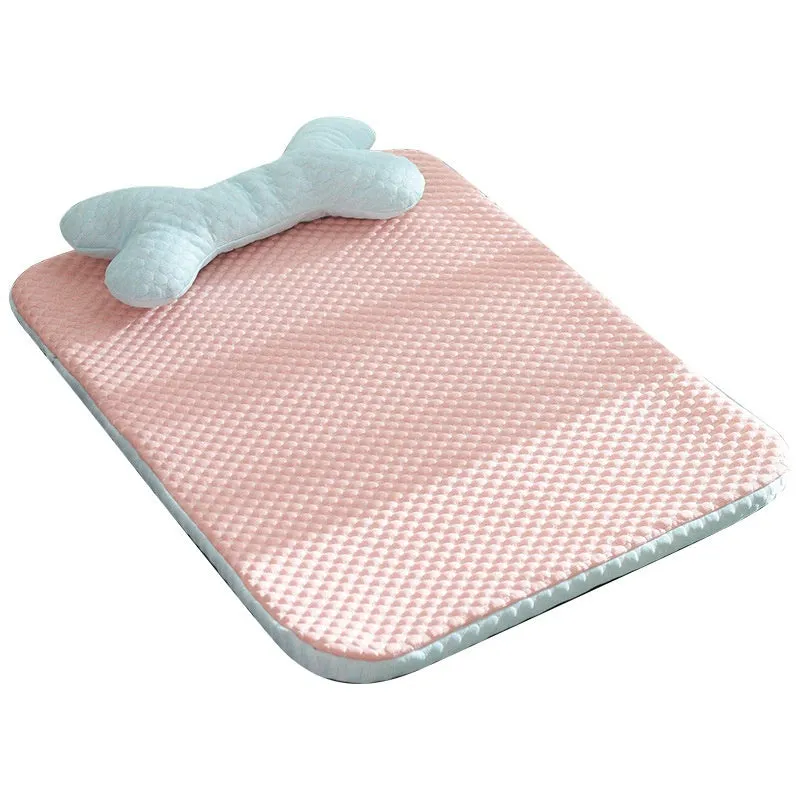 Pink dog cooling mat with ice bean fabric and mesh construction on a light background