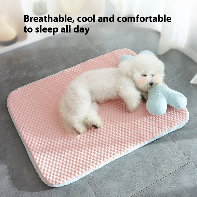 Pink dog cooling mat with ice bean fabric and mesh construction on a light background