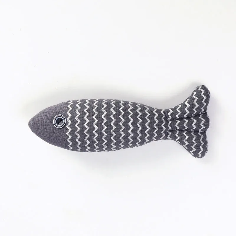Set of three linen fish cat biting toys in navy blue, red, and yellow. Each measures 21x9x5cm.