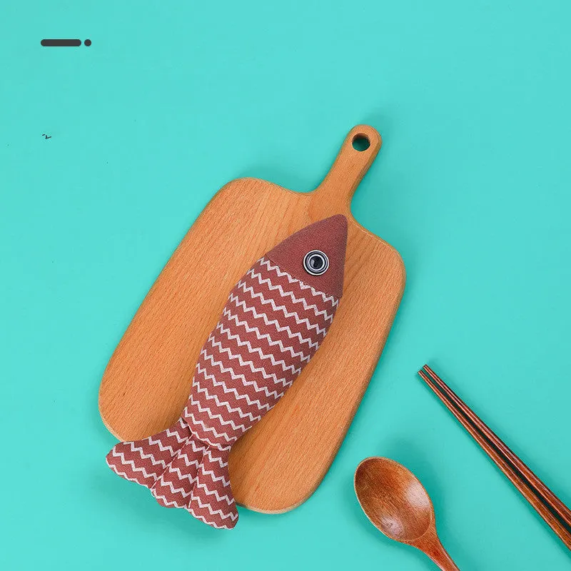 Set of three linen fish cat biting toys in navy blue, red, and yellow. Each measures 21x9x5cm.