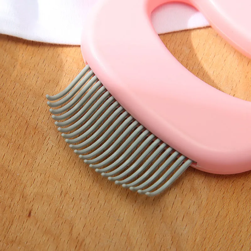 ABS plastic cat massage comb in blue, green, and pink colours, 10x9 cm, for grooming long and short haired cats