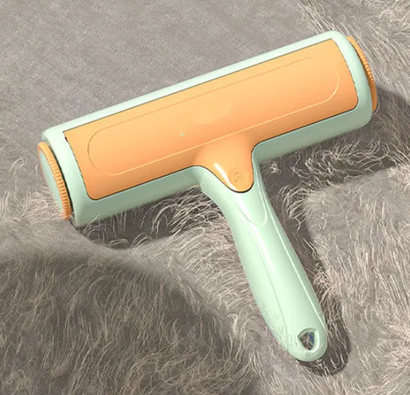 Pet hair remover roller brush with automatic cleaning, 19x18cm, in green orange, on a sofa surface.