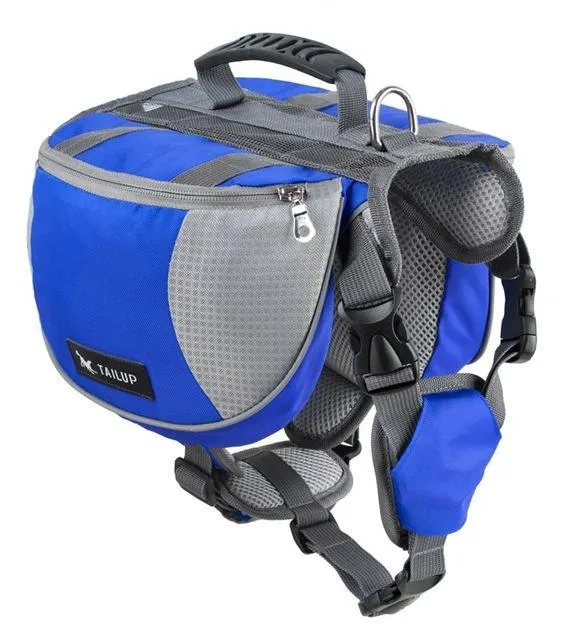 Black dog hiking pack with reflective tape and adjustable neck straps on Siberian Husky outdoors