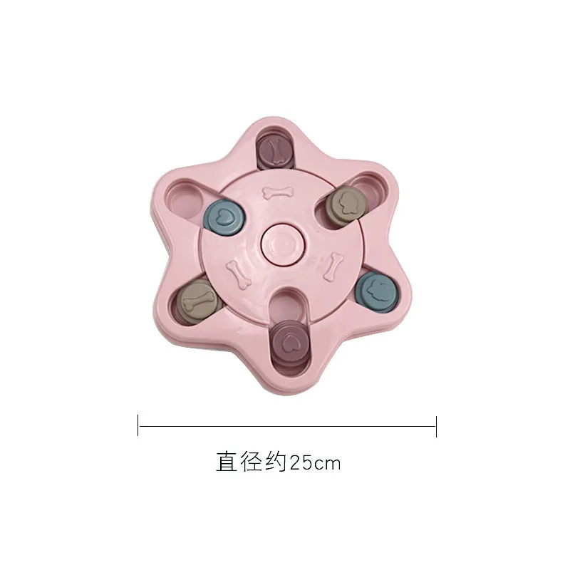 Educational dog toys anti choke dog bowl in pink plastic with non-slip bottom on a wooden floor