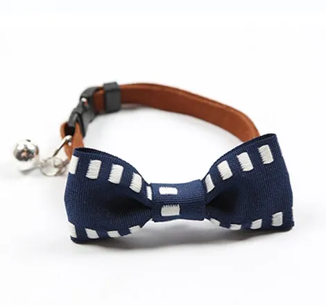 Pet tie in Blue Lattices pattern on a small dog wearing a collar