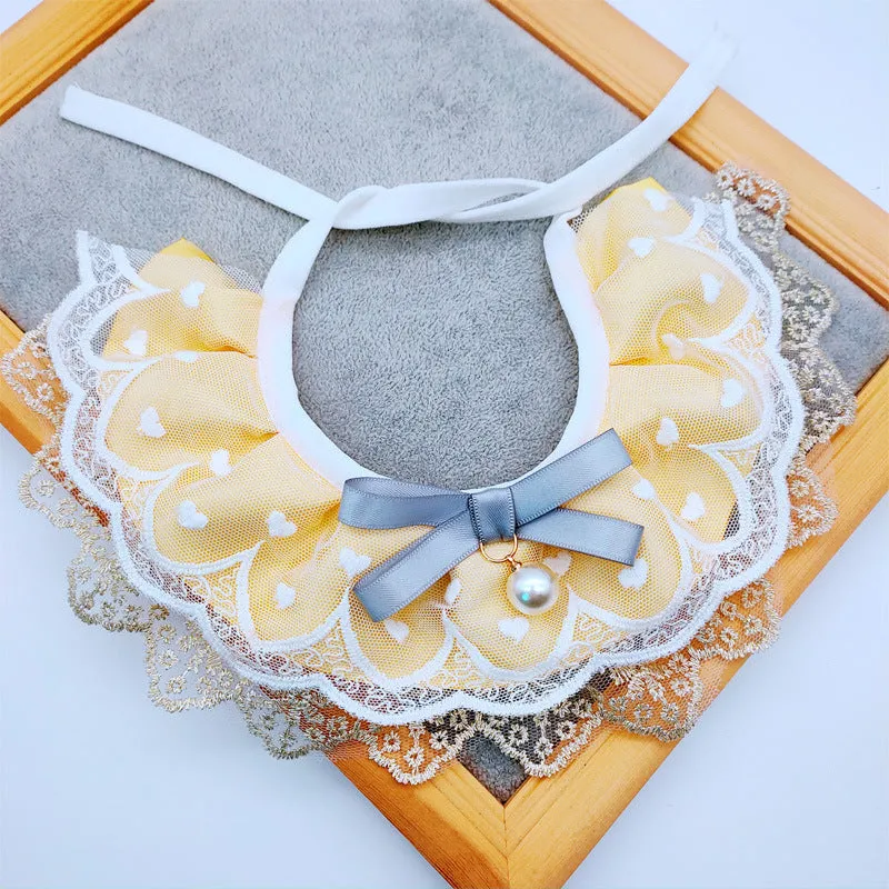 Yellow cat cotton bib with lace trim, princess style, on a white background showing front view with adjustable side lacing