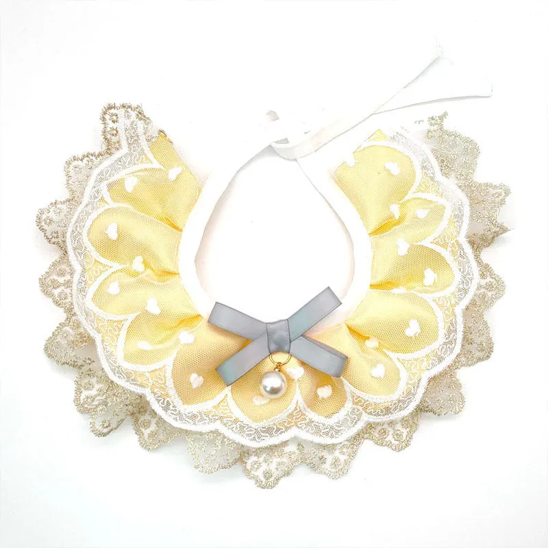 Yellow cat cotton bib with lace trim, princess style, on a white background showing front view with adjustable side lacing