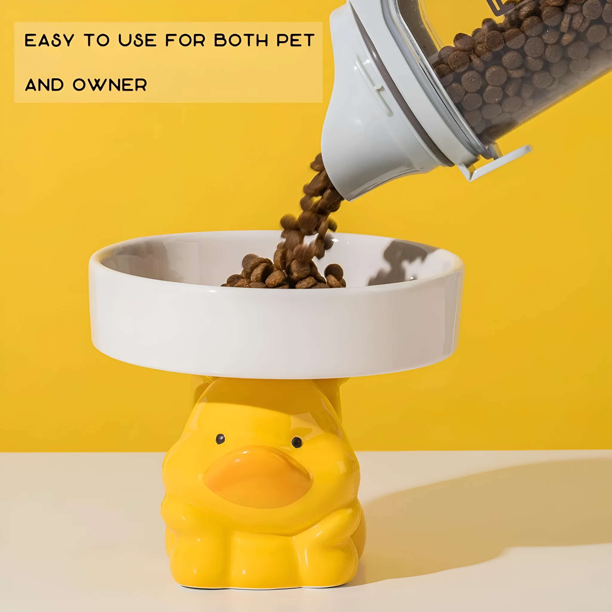 Raised ceramic pet bowl in animal design, showing wide shallow dish on elevated base.