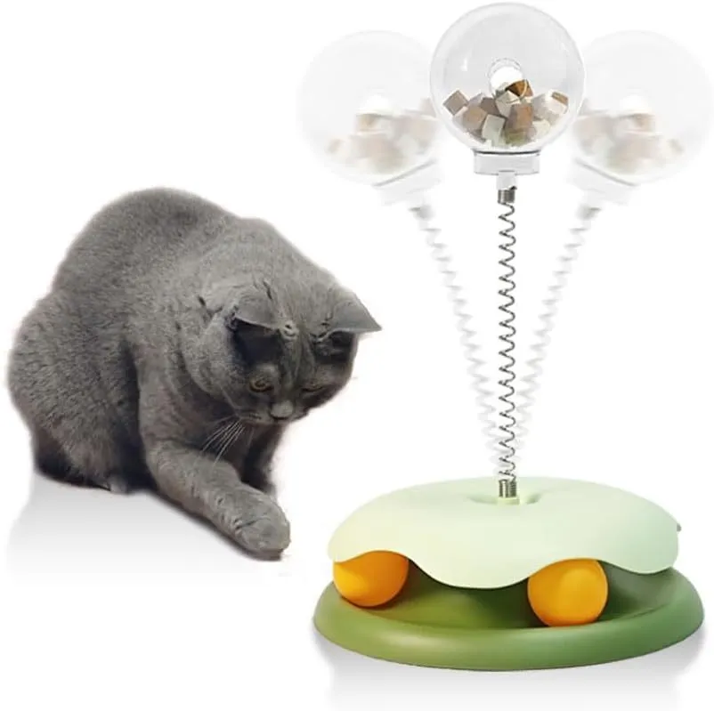 Blue interactive cat treat dispenser toy with track ball design for slow feeding