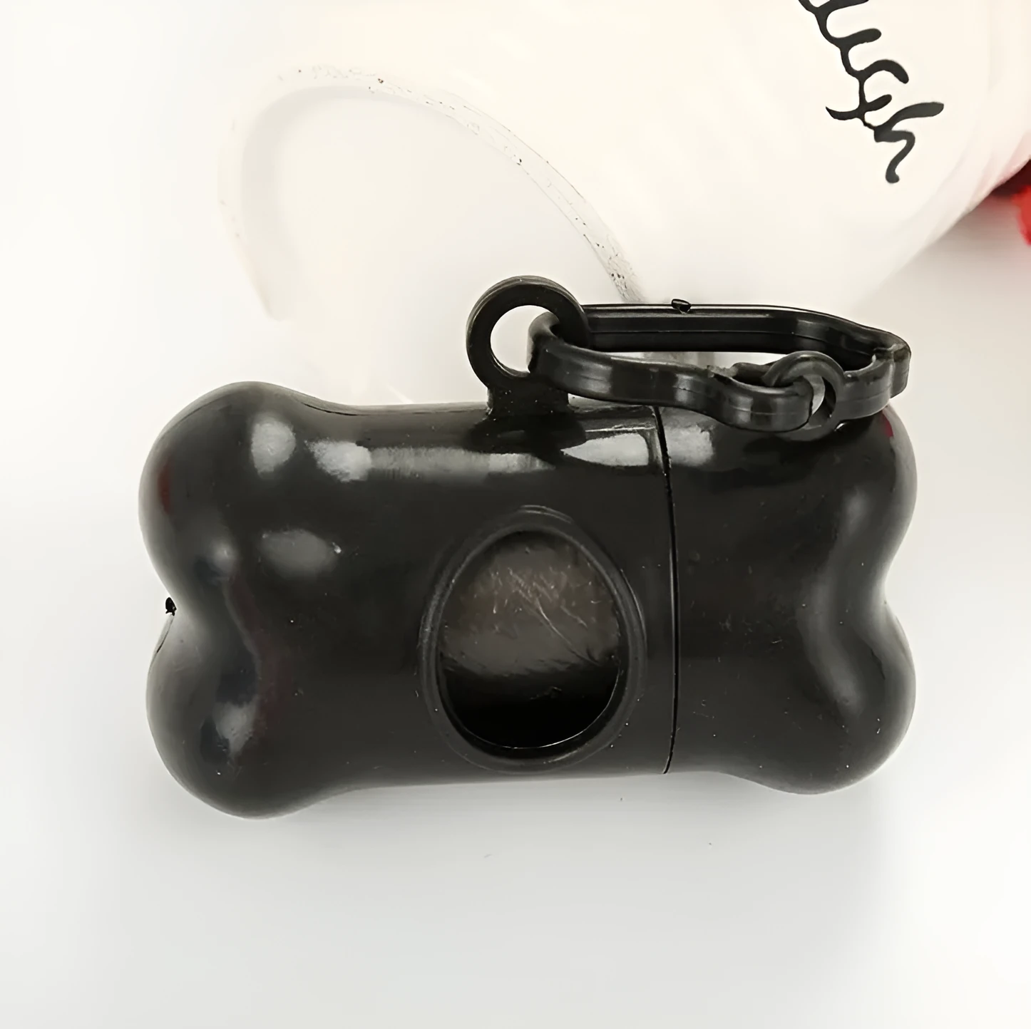 Black dog poop bag storage box in bone shape made from new PP material with loop hook