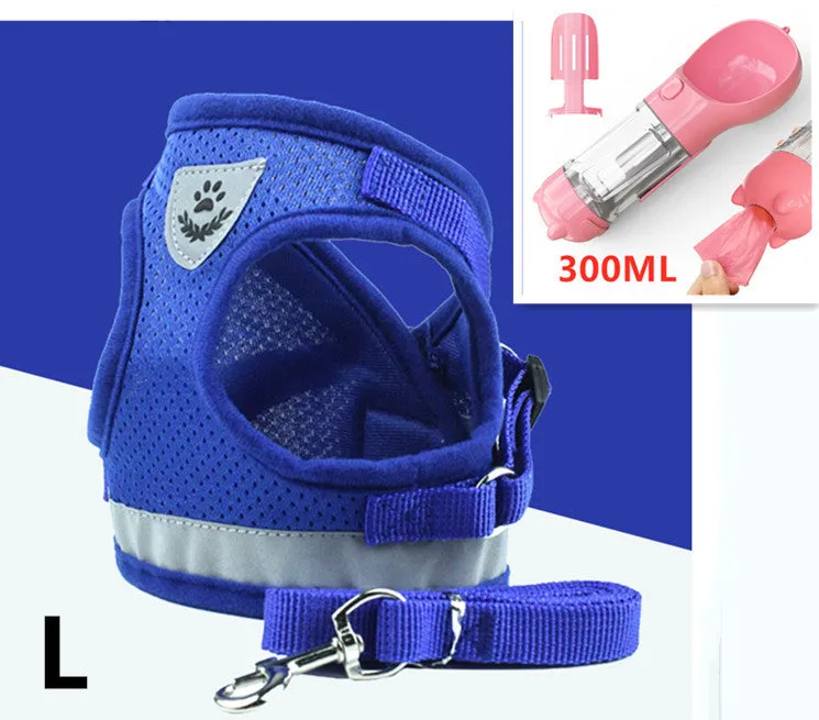 Blue breathable mesh dog harness with reflective belt for small and medium dogs, showing hook and loop closure and metal carabiner