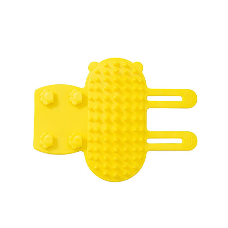 Silicone cat grooming comb with rounded teeth and adjustable strap for table mounting