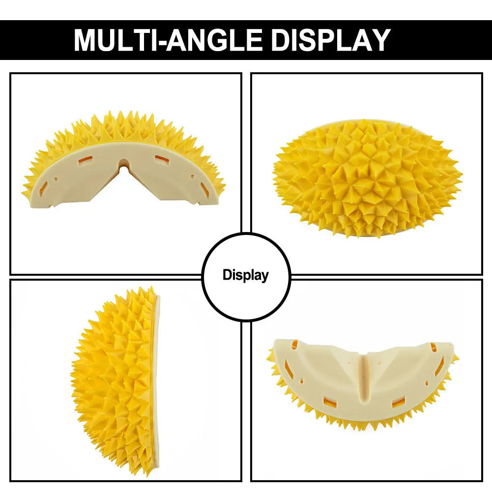 Durian-shaped cat tickling brush toy in green mounted on wall with rotating catnip ball