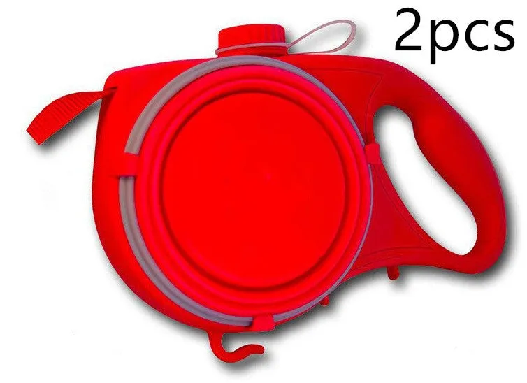 Blue retractable dog leash with ergonomic handle and silicone folding bowl on grass