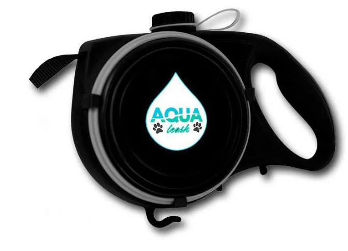 Blue retractable dog leash with ergonomic handle and silicone folding bowl on grass