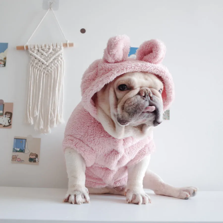 Cartoon embroidered coral velvet hooded pet vest in pink colour on a white background