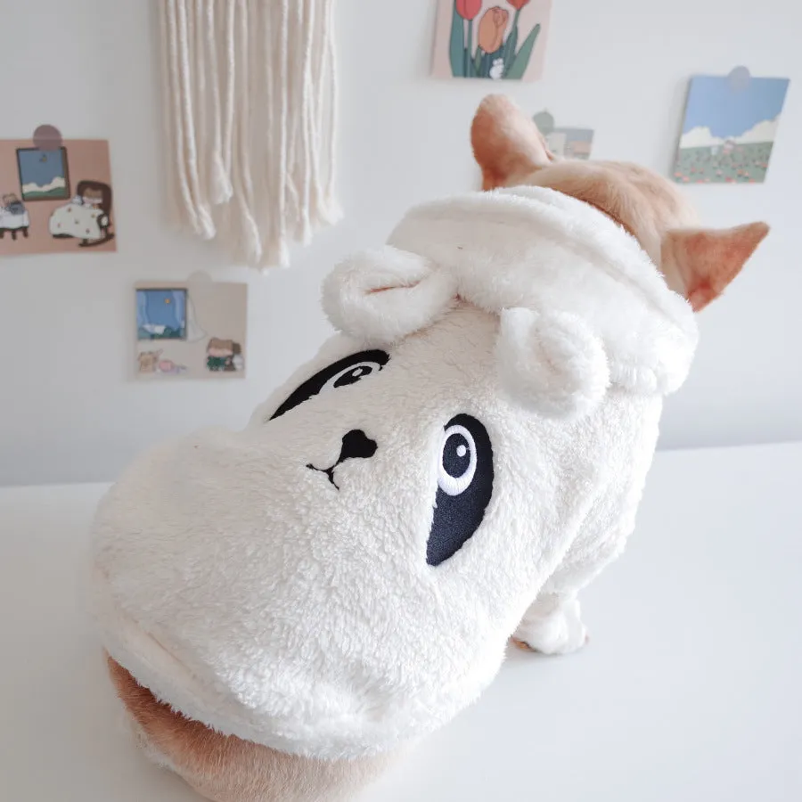 Cartoon embroidered coral velvet hooded pet vest in pink colour on a white background