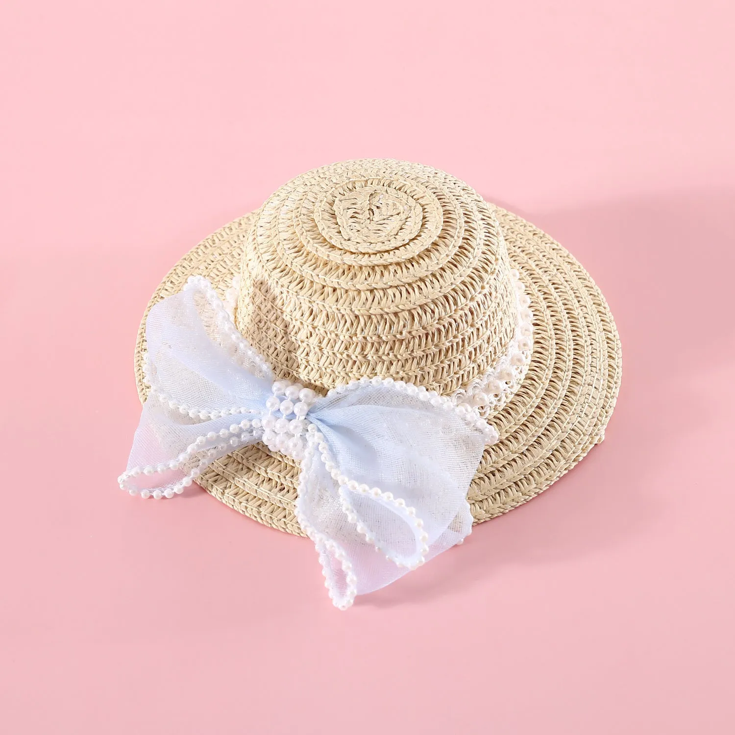 Woven straw cat hat with a pearl bow, shown in blue, pink, purple, and white colour options